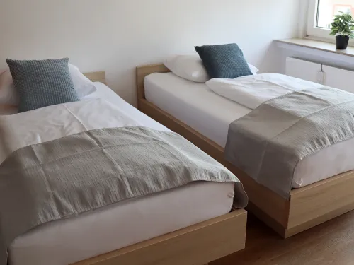 <p>Bequeme Betten für erholsame Nächte.</p>